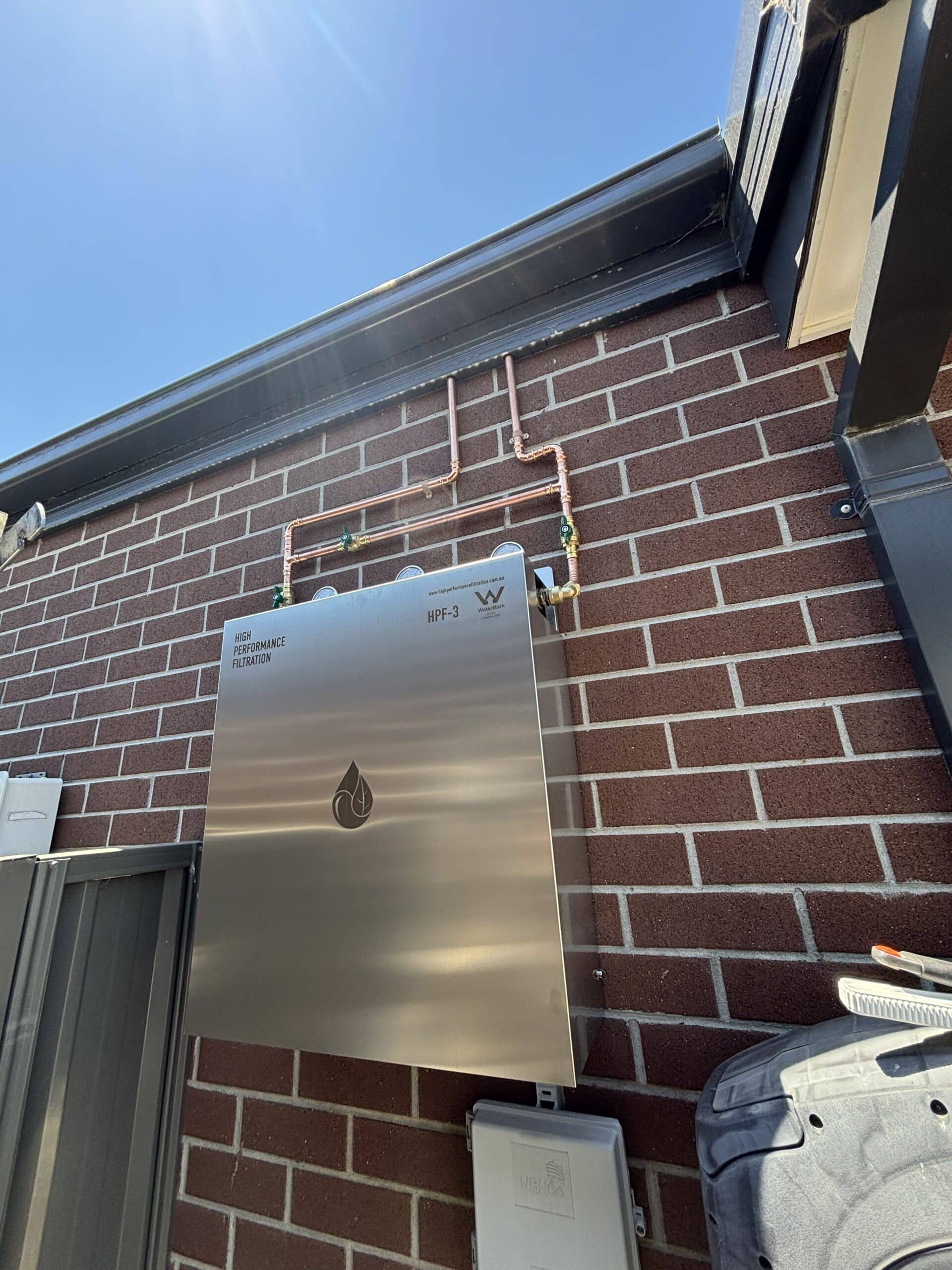 Close-up detail of wall-mounted filtration unit