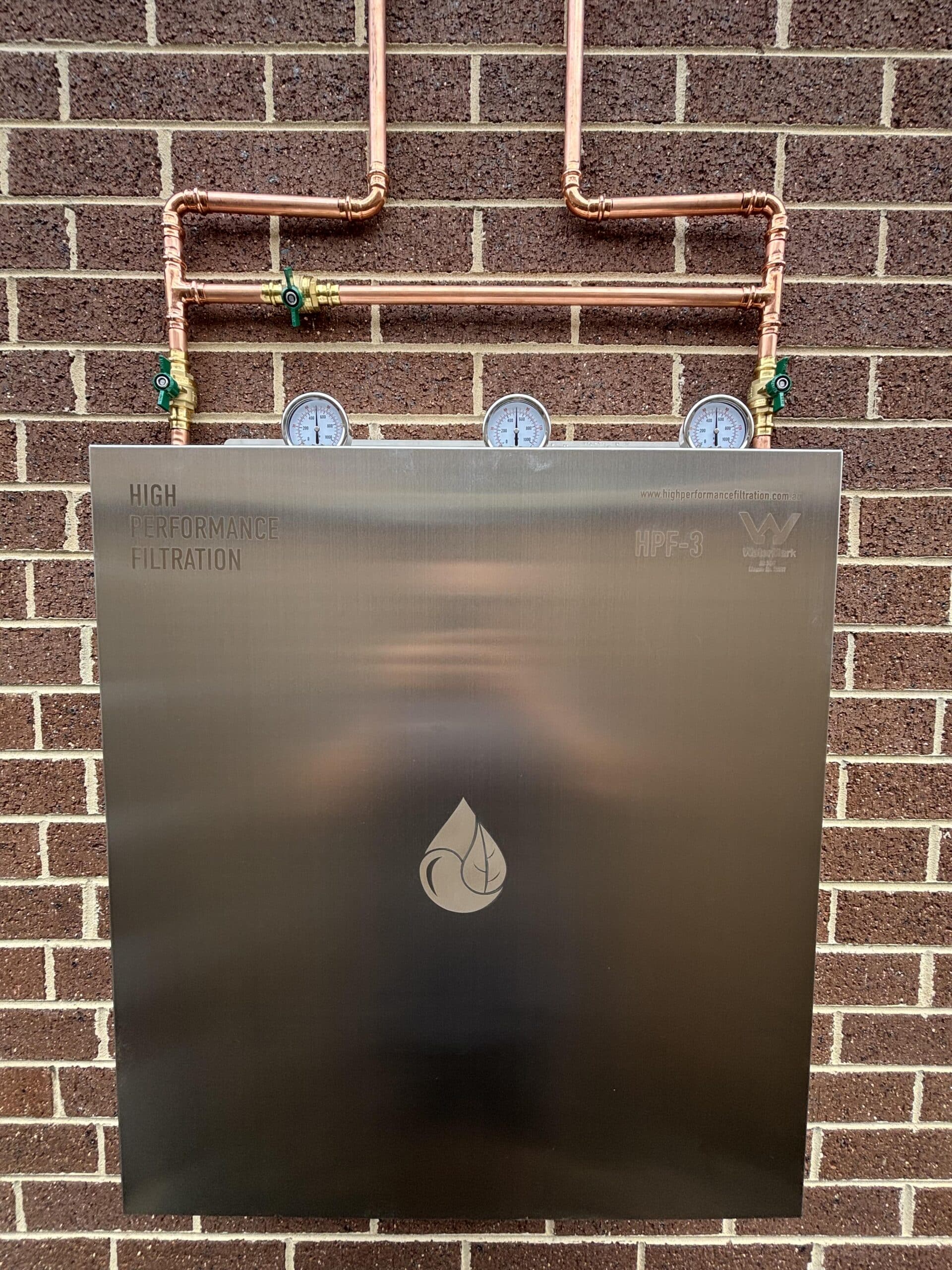 Copper pipework and filtration cabinet detail